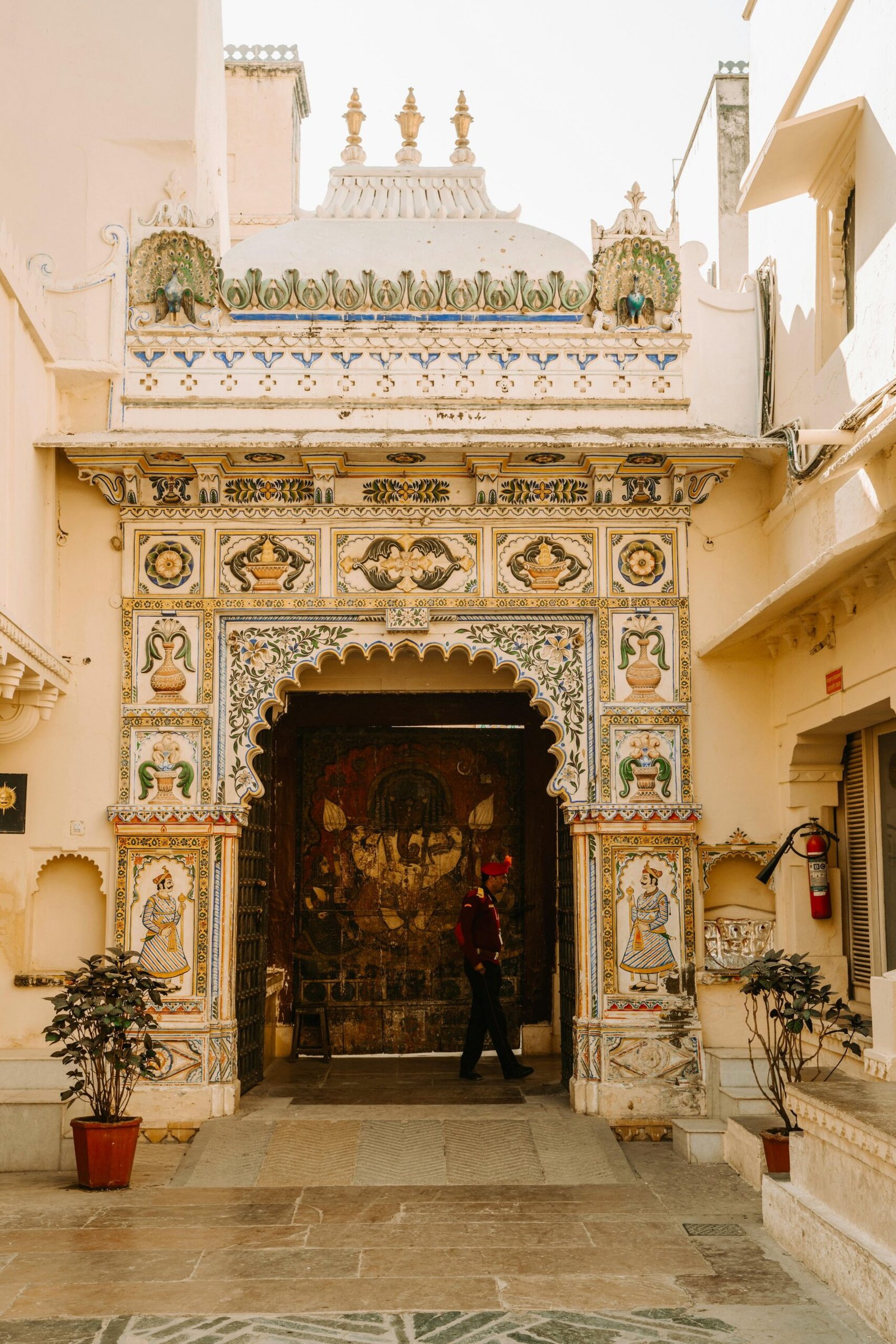 Beautifully adorned temple entrance in India showcasing detailed architecture and artistry.